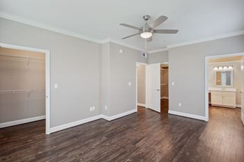 Room with ceiling fan and closet